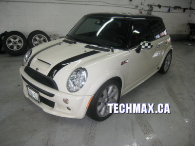Mini Cooper S with JCW bodyworks
2009 Mini Cooper with racing stripes and JCW body works for a different look 
Keywords: JCW body works for MINI Cooper